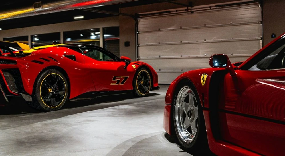 Several red sports cars parked indoors.